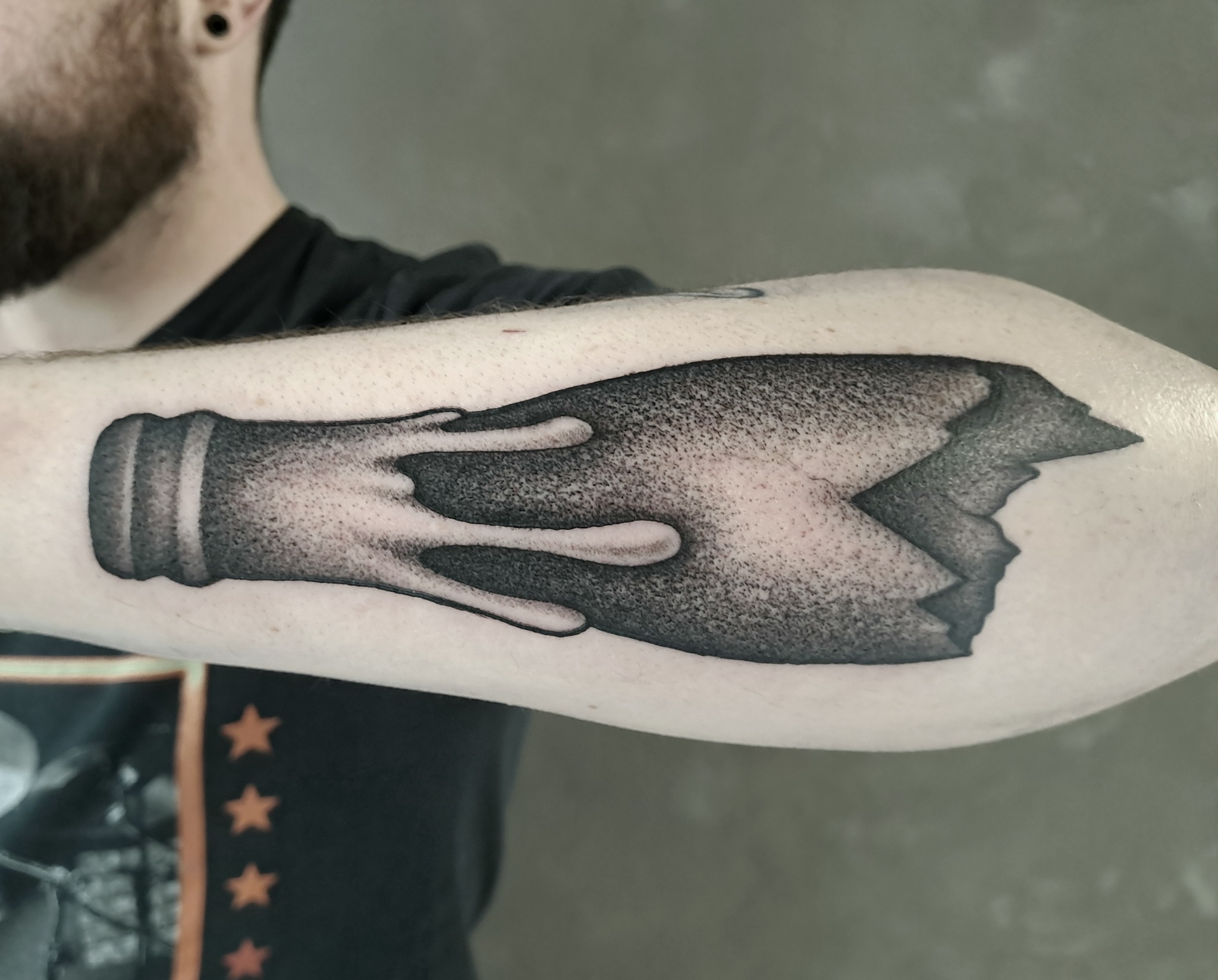 Illustrative blackwork hand tattoo